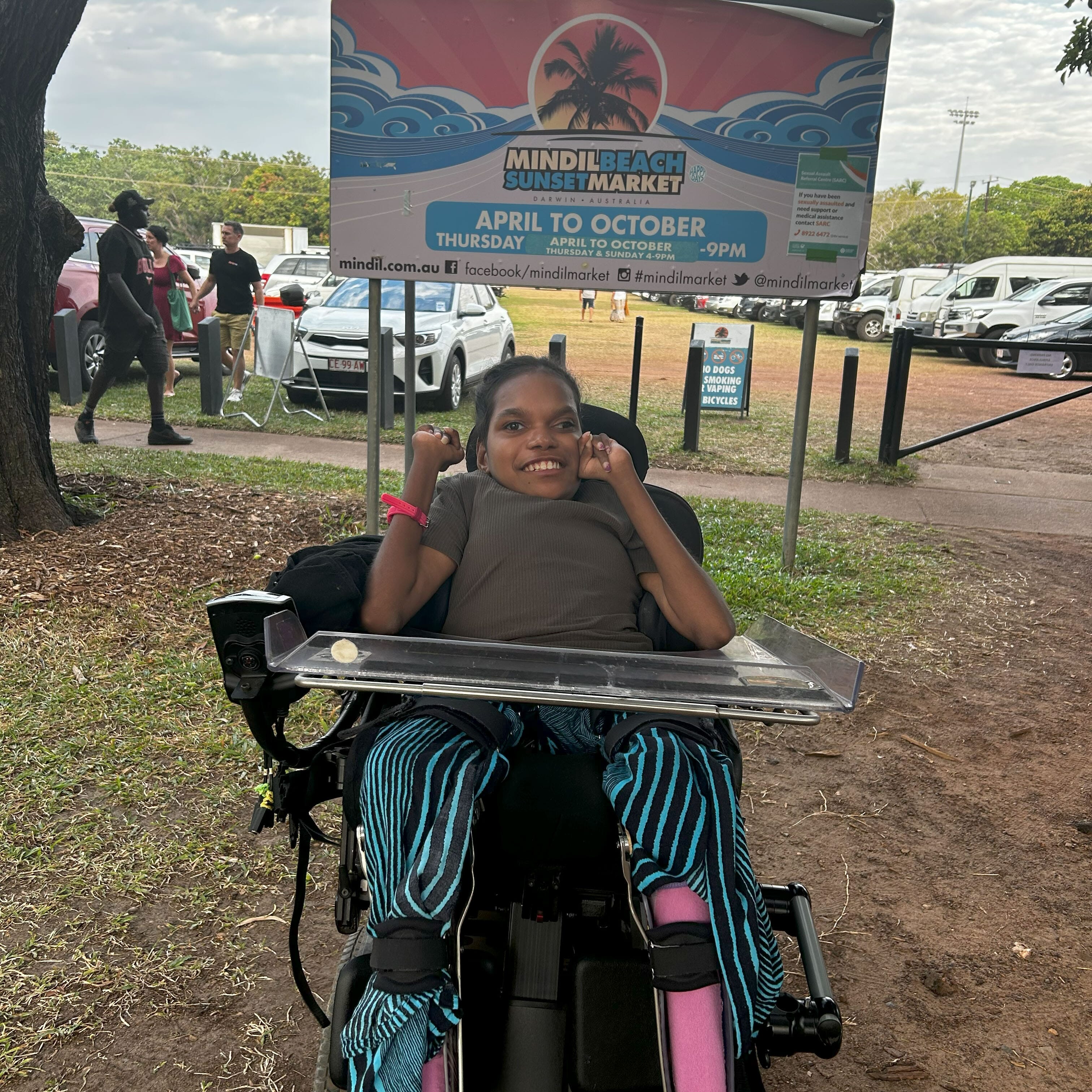 Stella visiting Mindil Beach Markets in Darwin during a community access outing.