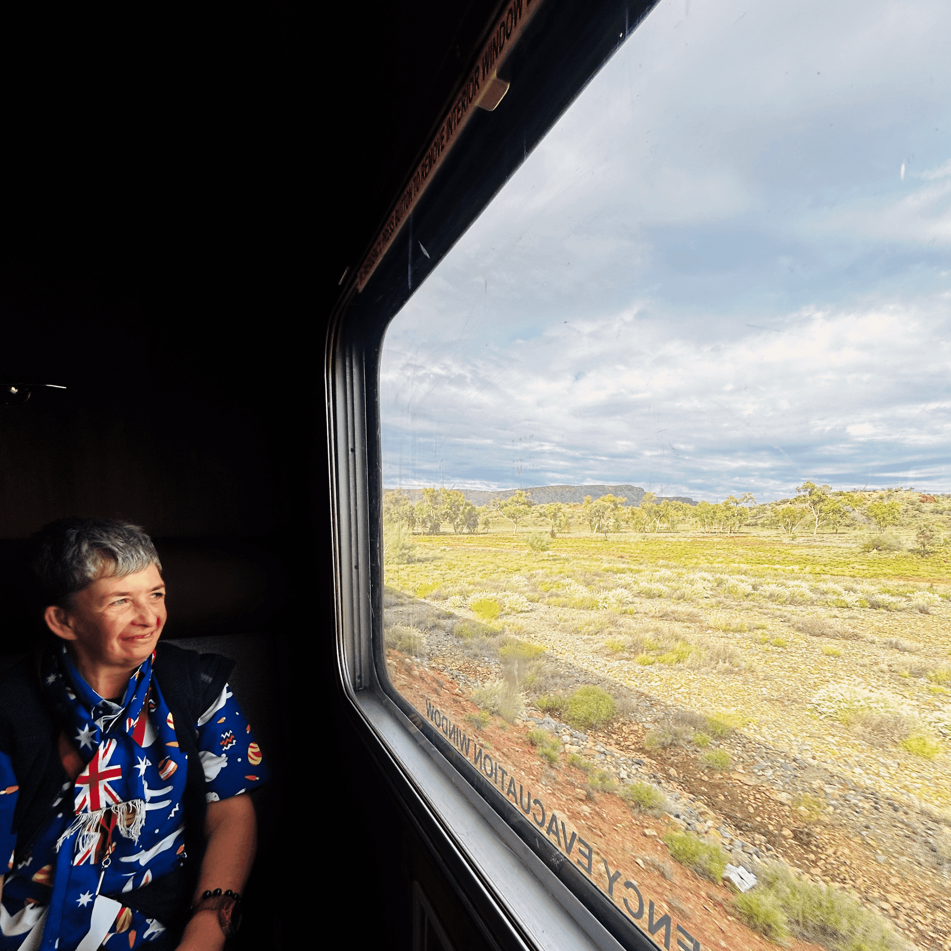Respite services—participant on an outing aboard The Ghan train